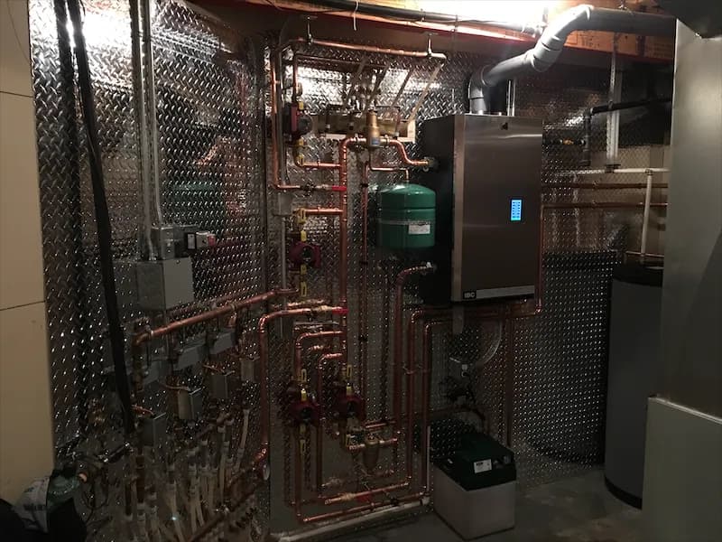 Hydronic radiant manifold and PEX distribution in an Airdrie home