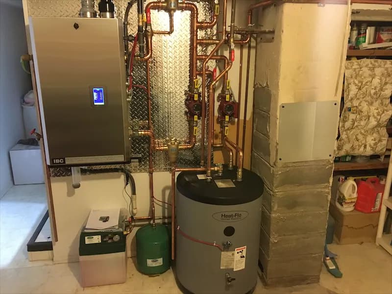 Hydronic manifold serving in-floor radiant heating loops in a Calgary home