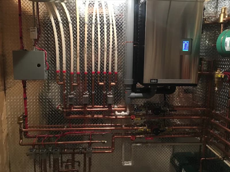 Condensing boiler with neutralizer and condensate drain