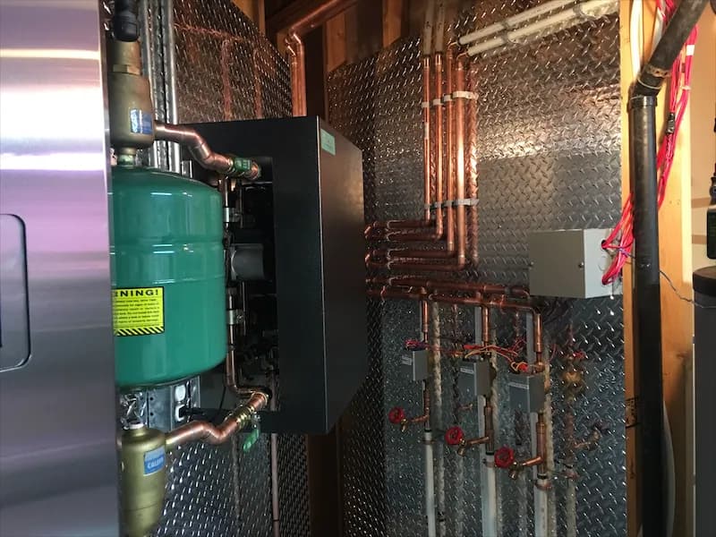 Tidy combi boiler piping with labelled isolation valves