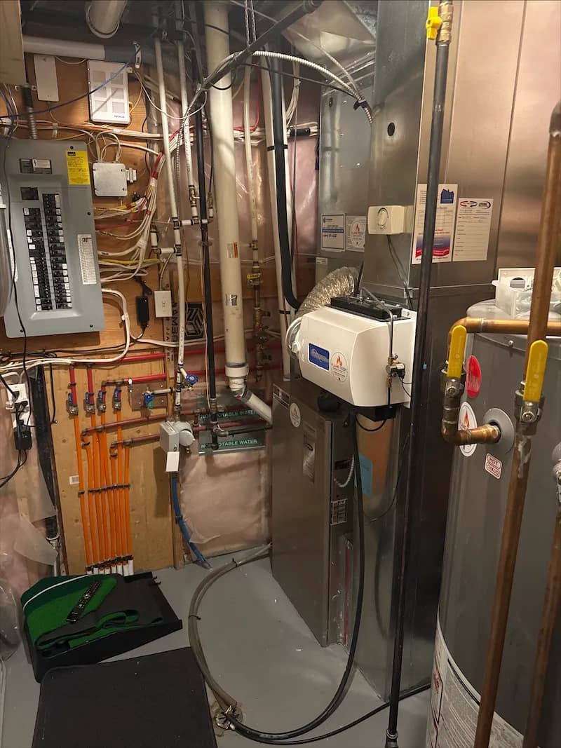 Old furnace before high-efficiency replacement