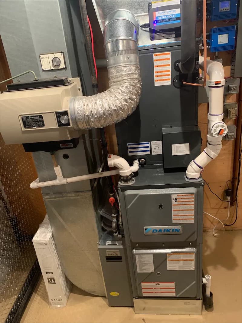 Finished high-efficiency furnace install in a Calgary basement