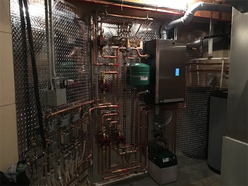 Condensing boiler diagnosed and repaired by FlameTech in Calgary