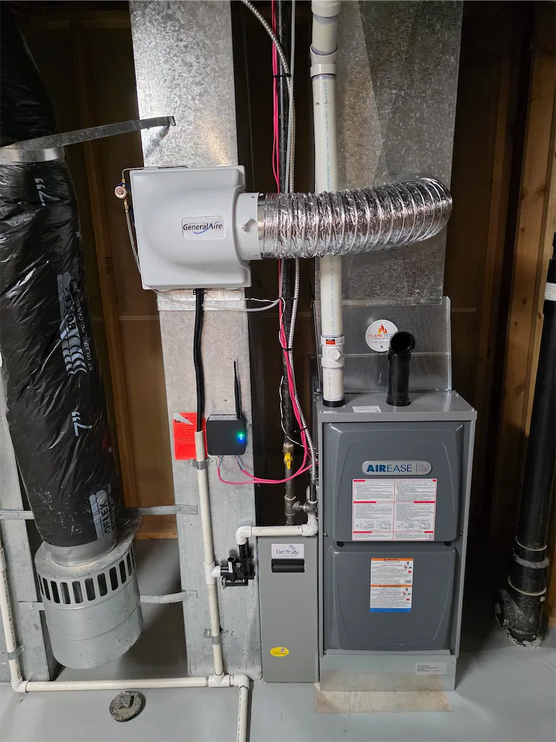 AirEase furnace with humidifier and air filter — annual maintenance setup in a Calgary home