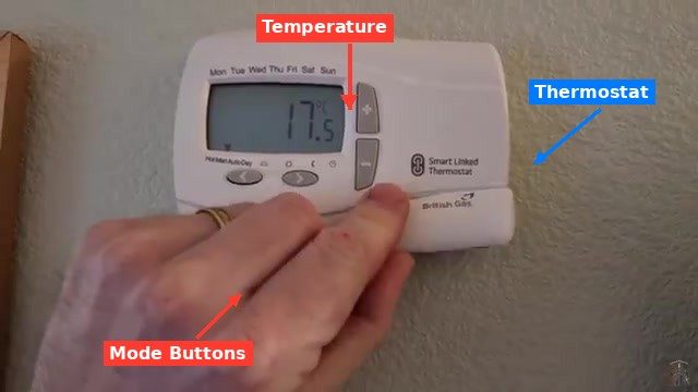 Smart linked thermostat showing 17.5 degrees Celsius with mode buttons